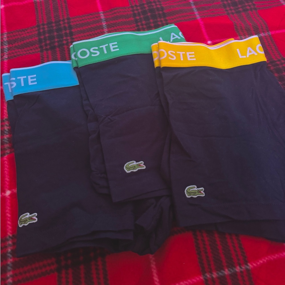 Lacoste, Men’s Trunks, Size Small (28-30)
3 pairs (New, Unworn)